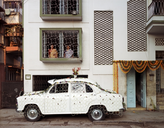Laura McPhee<br /> <em><span style="font-size:12px;"><span style="font-family: arial, sans-serif;">Ambassador Car Decorated for a Wedding by a Net Strung with Fresh Flowers, South Kolkata, 1998</span></span></em><br /> Archival Pigment Ink Prints<br /> 30 x 40" &nbsp; &nbsp;Edition of 5<br /> 40 x 50" &nbsp; &nbsp;Edition of 5<br /> 50 x 60" &nbsp; &nbsp;Edition of 5<br /> 60 x 75" &nbsp; &nbsp;Edition of 5