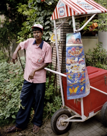 Laura McPhee<br /> <span style="font-size:12px;"><em><span style="font-family: arial, sans-serif;">Ganesh Das, Ice Cream Man, Jodhpur Park, Kolkata, 1998</span></em></span><br /> Archival Pigment Ink Prints<br /> 20 x 24" Edition of 5 <br />Additional sizes available, please contact gallery for more information