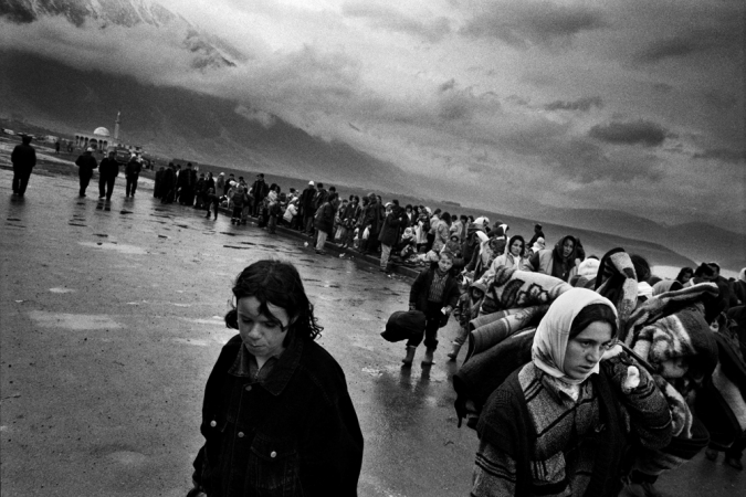 Paolo Pellegrin<br /> <em>Fleeing Kosovar refugees arrive in Kukes, Albania. 1999</em><br /> Pigment ink print<br />20 x 24” &nbsp; &nbsp;Edition of 10 plus 2 APs<br /> 30 x 40” &nbsp; &nbsp;Edition of 5 plus 2 APs<br /> 48 x 70” &nbsp; &nbsp;Edition of 3 plus 2 APs