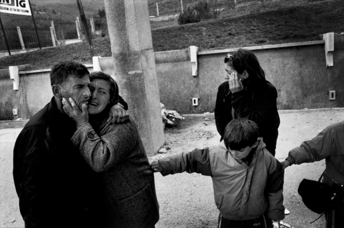 Paolo Pellegrin<br /> <em>Found: A man thought lost is greeted by his family at the Albanian border at Morina, 1998</em><br /> Pigment ink print<br />20 x 24” &nbsp; &nbsp;Edition of 10 plus 2 APs<br /> 30 x 40” &nbsp; &nbsp;Edition of 5 plus 2 APs<br /> 48 x 70” &nbsp; &nbsp;Edition of 3 plus 2 APs