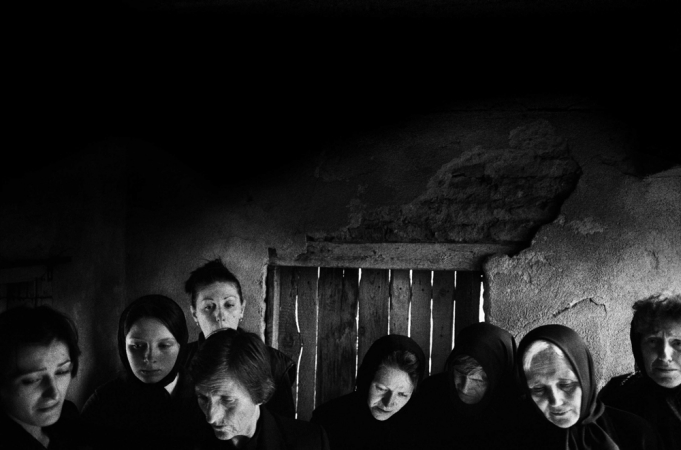 Paolo Pellegrin<br /> <em>Serbian women mourn a man killed by Albanians in the city of Obilic, Kosovo. 2000</em><br /> Pigment ink print<br />20 x 24” &nbsp; &nbsp;Edition of 10 plus 2 APs<br /> 30 x 40” &nbsp; &nbsp;Edition of 5 plus 2 APs<br /> 48 x 70” &nbsp; &nbsp;Edition of 3 plus 2 APs