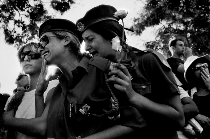 Paolo Pellegrin<br /> <em>Israeli soldiers and families mourn the death of three IDF women soldiers killed in attack in Gaza</em>,&nbsp;2003 &nbsp;&nbsp;<br /> Pigment ink print<br /> 20 x 24” &nbsp; &nbsp;Edition of 10 plus 2 APs<br /> 30 x 40” &nbsp; &nbsp;Edition of 5 plus 2 APs<br /> 48 x 70” &nbsp; &nbsp;Edition of 3 plus 2 APs&nbsp;<br />