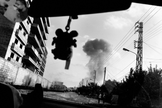 Paolo Pellegrin<br /> <em>Moments after Israeli aircraft hit a building in downtown Tyre, Lebanon</em>, 2006<br /> Pigment ink print<br /> 20 x 24” &nbsp; &nbsp;Edition of 10 plus 2 APs<br /> 30 x 40” &nbsp; &nbsp;Edition of 5 plus 2 APs<br /> 48 x 70” &nbsp; &nbsp;Edition of 3 plus 2 APs&nbsp;<br />