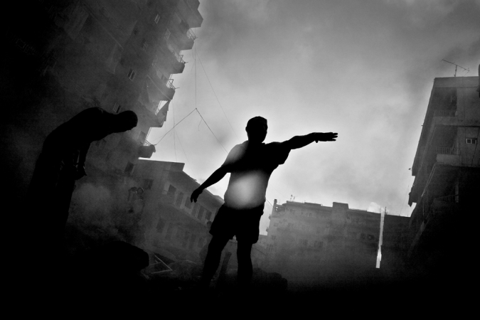 Paolo Pellegrin<br /> <em>Moments after Israeli aircraft hit a building in downtown Tyre, Lebanon</em>, 2006<br /> Pigment ink print<br /> 20 x 24” &nbsp; &nbsp;Edition of 10 plus 2 APs<br /> 30 x 40” &nbsp; &nbsp;Edition of 5 plus 2 APs<br /> 48 x 70” &nbsp; &nbsp;Edition of 3 plus 2 APs&nbsp;<br />