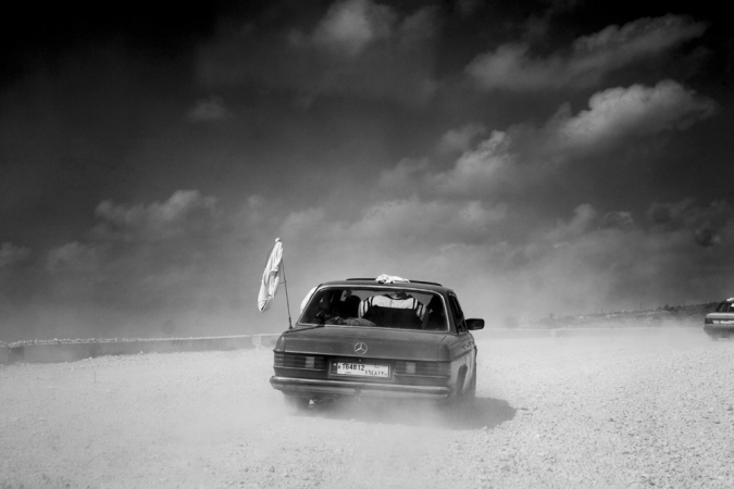 Paolo Pellegrin<br /> <em>Civilians fleeing along the road to the border town of Ramesh, Lebanon,</em> July 2006<br /> Pigment ink print<br /> 20 x 24” &nbsp; &nbsp;Edition of 10 plus 2 APs<br /> 30 x 40” &nbsp; &nbsp;Edition of 5 plus 2 APs<br /> 48 x 70” &nbsp; &nbsp;Edition of 3 plus 2 APs&nbsp;<br />