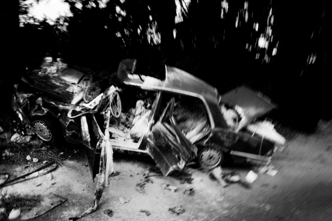 Paolo Pellegrin<br /> <em>The ruins of a car hit by a Israeli rocket lays on the road to Qana, Lebanon</em>, 2006<br /> Pigment ink print<br /> 20 x 24” &nbsp; &nbsp;Edition of 10 plus 2 APs<br /> 30 x 40” &nbsp; &nbsp;Edition of 5 plus 2 APs<br /> 48 x 70” &nbsp; &nbsp;Edition of 3 plus 2 APs&nbsp;<br />