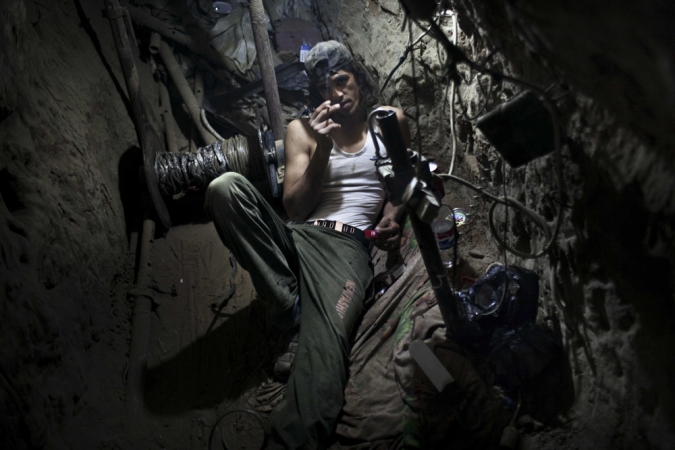Paolo Pellegrin<br /> <em>This Gazan university student works in a tunnel, hauling goods to earn money for tuition, Gaza, Palestine 2011</em><br /> Pigment ink print<br />20 x 24” &nbsp; &nbsp;Edition of 10 plus 2 APs<br /> 30 x 40” &nbsp; &nbsp;Edition of 5 plus 2 APs<br /> 48 x 70” &nbsp; &nbsp;Edition of 3 plus 2 APs