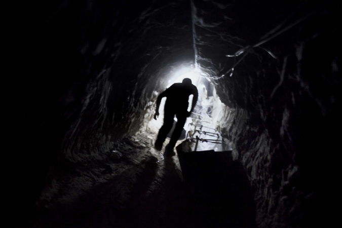Paolo Pellegrin<br /> <em>A worker emerges from one of hundreds of smuggling tunnels that connect the Gaza Strip and Egypt. Gaza, Palestine 2011</em><br /> Pigment ink print<br />20 x 24” &nbsp; &nbsp;Edition of 10 plus 2 APs<br /> 30 x 40” &nbsp; &nbsp;Edition of 5 plus 2 APs<br /> 48 x 70” &nbsp; &nbsp;Edition of 3 plus 2 APs