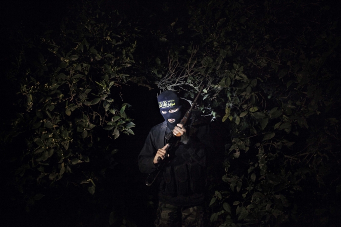 Paolo Pellegrin<br /> <em>Members of the militant group Islamic Jihad patrol the border with Israel to prevent incursions by the Israel Defense Forces, Gaza, Palestine 2011</em><br /> Pigment ink print<br />20 x 24” &nbsp; &nbsp;Edition of 10 plus 2 APs<br /> 30 x 40” &nbsp; &nbsp;Edition of 5 plus 2 APs<br /> 48 x 70” &nbsp; &nbsp;Edition of 3 plus 2 APs