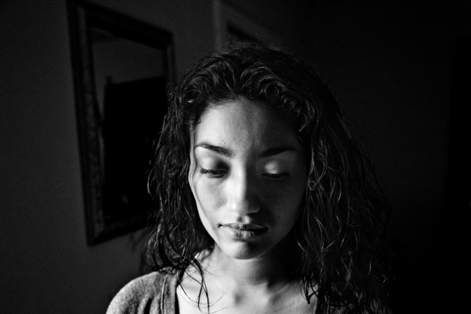 Paolo Pellegrin<br /> <em>Vanelia, a young mother from Puerto Rico, in her home in the Crescent neighborhood. Rochester, NY. USA 2012</em><br /> Pigment ink print<br />20 x 24” &nbsp; &nbsp;Edition of 10 plus 2 APs<br /> 30 x 40” &nbsp; &nbsp;Edition of 5 plus 2 APs<br /> 48 x 70” &nbsp; &nbsp;Edition of 3 plus 2 APs
