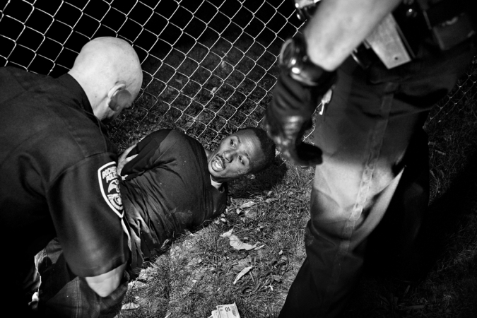 Paolo Pellegrin<br /> <em>A man arrested by Rochester's SWAT unit after running away from the police while carrying a weapon. Rochester, NY. USA 2012</em><br /> Pigment ink print<br /> 20 x 24” &nbsp; &nbsp;Edition of 10 plus 2 APs<br /> 30 x 40” &nbsp; &nbsp;Edition of 5 plus 2 APs<br /> 48 x 70” &nbsp; &nbsp;Edition of 3 plus 2 APs