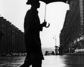 Benn Mitchell, Man with Umbrella in rain, 1947