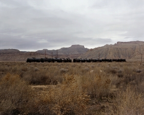 Laura McPhee<br /> <em>Tanker Train, Moab Uranium Mill Tailings Disposal Site, Crescent Junction, Utah, </em>2011<br /> 40 x 50"<br /> Archival pigment ink print<br /> Signed, titled, dated and numbered on verso<br /> Edition of 5
