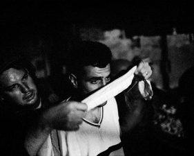 Paolo Pellegrin<br /> <em>Israeli reservists on patrol, hunting suicide bombers. Blindfolded suspects are lined up before being taken to the soldiers base near a Jewish settlement, West Bank, Palestine</em>, 2002<br /> Pigment ink print<br /> 20 x 24” &nbsp; &nbsp;Edition of 10 plus 2 APs<br /> 30 x 40” &nbsp; &nbsp;Edition of 5 plus 2 APs<br /> 48 x 70” &nbsp; &nbsp;Edition of 3 plus 2 APs&nbsp;<br />