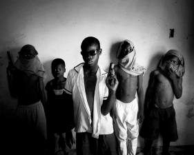 Paolo Pellegrin<br /> <em>A baby gang in the Port-au-Prince slum of Cite Soleil,&nbsp;HAITI, </em>February 2006.&nbsp;<br /> Pigment ink print<br /> 20 x 24” &nbsp; &nbsp;Edition of 10 plus 2 APs<br /> 30 x 40” &nbsp; &nbsp;Edition of 5 plus 2 APs<br /> 48 x 70” &nbsp; &nbsp;Edition of 3 plus 2 APs&nbsp;<br />