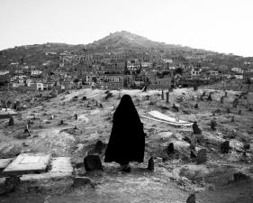 Paolo Pellegrin<br /> <em>At dawn a woman walks though the Ziamate Sakhi cemetary in Kabul, Afghanistan. June 2006</em><br /> Pigment ink print<br />20 x 24” &nbsp; &nbsp;Edition of 10 plus 2 APs<br /> 30 x 40” &nbsp; &nbsp;Edition of 5 plus 2 APs<br /> 48 x 70” &nbsp; &nbsp;Edition of 3 plus 2 APs