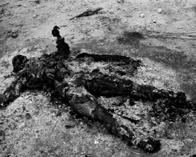 Paolo Pellegrin<br /> <em>Burning corpses in downtown Port au Prince. Earthquake aftermath. Haiti</em> 2010<br /> Pigment ink print<br /> 12 x 24” &nbsp; &nbsp;Edition of 10 plus 2 APs<br /> 20 x 40” &nbsp; &nbsp;Edition of 5 plus 2 APs<br /> 35 x 70” &nbsp; &nbsp;Edition of 3 plus 2 APs&nbsp;<br />
