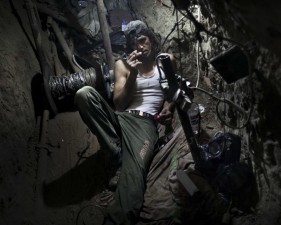 Paolo Pellegrin<br /> <em>This Gazan university student works in a tunnel, hauling goods to earn money for tuition, Gaza, Palestine 2011</em><br /> Pigment ink print<br />20 x 24” &nbsp; &nbsp;Edition of 10 plus 2 APs<br /> 30 x 40” &nbsp; &nbsp;Edition of 5 plus 2 APs<br /> 48 x 70” &nbsp; &nbsp;Edition of 3 plus 2 APs