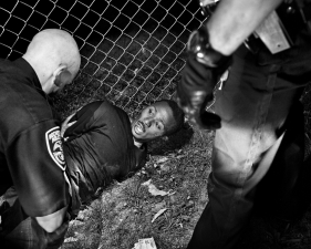 Paolo Pellegrin<br /> <em>A man arrested by Rochester's SWAT unit after running away from the police while carrying a weapon. Rochester, NY. USA 2012</em><br /> Pigment ink print<br /> 20 x 24” &nbsp; &nbsp;Edition of 10 plus 2 APs<br /> 30 x 40” &nbsp; &nbsp;Edition of 5 plus 2 APs<br /> 48 x 70” &nbsp; &nbsp;Edition of 3 plus 2 APs