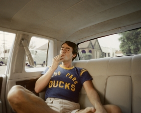 Roger Steffens and The Family Acid<br /> <i>Driving in High Style, August,&nbsp;</i>1977<br /> Archival pigment print<br /> 20 x 24" &nbsp; &nbsp; Edition of 8